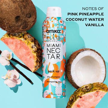 Amika x Ellis Brooklyn Miami Nectar Perk Up Dry Shampoo, coconut, pink pineapple, flowers, and vanilla beans on teal background with black text that reads "Notes of Pink Pineapple, Coconut Water, Vanilla"