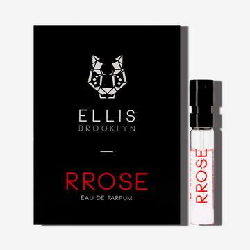 Rrose 1.5ml Eau De Parfum Vial next to black Rrose Eau De Parfum vial holder card.