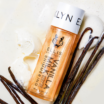 Vanilla Milk Shimmering Scented Body Oil 95ml on melted vanilla ice cream with vanilla beans.