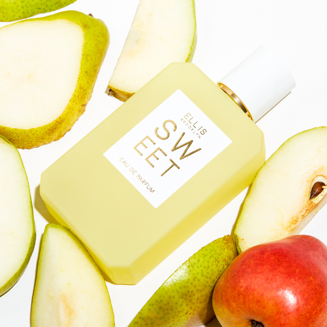 SWEET 100ml bottle near apples