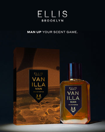 Vanilla Man 50ml Eau De Parfum next to Vanilla Man Eau De Parufm box in spotlight, on black background with white Ellis Brooklyn logo and white text that reads "Man Up Your Scent Game."