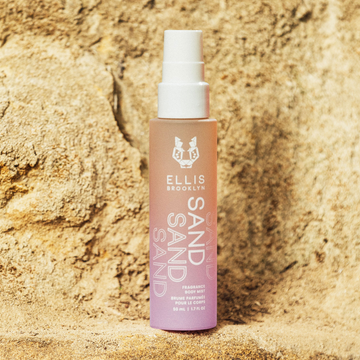IMAGE 5: SAND FRAGRANCE AND BODY MIST AGAINST ROCK
