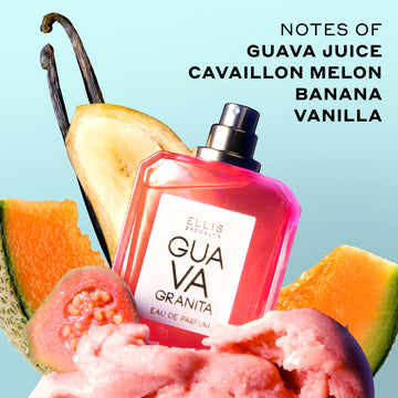 Guava Granita 50ml Eau De Parfum with cap removed in pink sorbet with slice of guava, banana slice, cantaloupe slices and vanilla beans against blue background with black text that reads "Notes of Guava Juice, Cavaillon Melon, Banana, Vanilla".