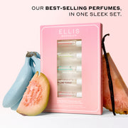 Best Sellers Discovery Set between blue bananas, slice of guava, vanilla bean, and slice of pink pineapple on a white surface with a pink background with black text that reads "Our best-selling perfumes, in one sleek set."