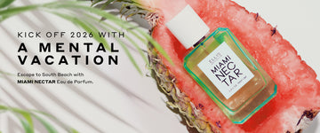 Miami Nectar Eau de Parfum 50ml inside a cut half of a pink pineapple on a white background with green leaves and black text reading "Kick Off 2026 With A Mental Vacation. Escape to South Beach with Miami Nectar Eau de Parfum". 