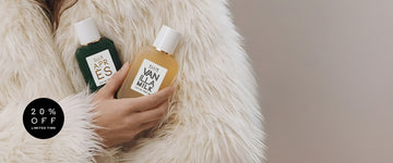 Model in white fur coat holds APRÈS Eau de Parfum 50ml and VANILLA MILK Eau de Parfum 50ml in their right hand against their chest and a black circle with white text that reads "20% off. Limited time." on a beige background.