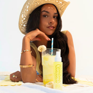 IMAGE 6: MODEL WITH BANANA MILKSHAKE 50ML AND GLASS