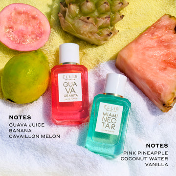 Half guava, whole guava, whole pineapple, and slice of pink pineapple on yellow and white striped beach towel above Guava Granita 7.5ml Eau De Parfum Mini Dabber, black next that reads "Notes Guava Juice Bannana Cavaillon Melon" and Miami Nectar 7.5ml Eau De Parfum Mini Dabber and black text that reads "Notes Pink Pineapple Coconut Water Vanilla"
