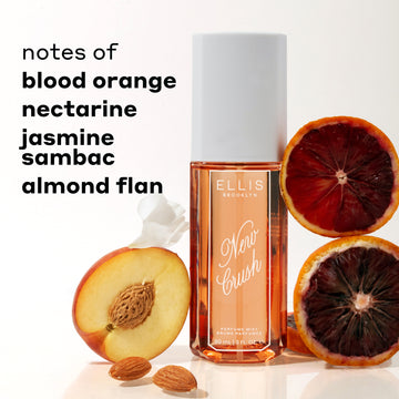 NEW CRUSH Perfume Mist 90ml between sliced blood oranges, sliced nectarine, white flower petal and almonds against white background with black text that reads "notes of blood orange, nectarine, jasmine sambac, almond flan"
