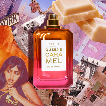 QUEENS CARAMEL Eau de Parfum 50ml without cap on collage of NYC skyline, newspapers, white chocolate, pink and gold rhinestone butterfly necklaces, pink and white sweater, caramel, bridge, and woman with black hair wearing a black tank top holding a gold necklace that says "Queen"