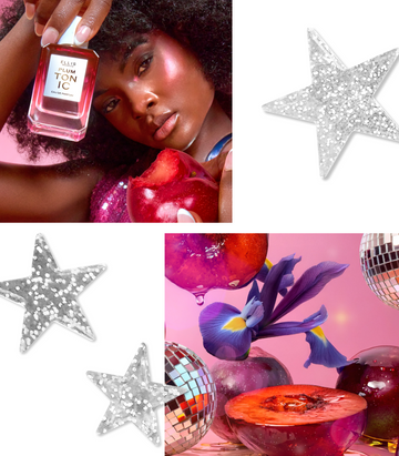 Collage of a woman with brown hair wearing a purple sequin tank top and pink highlighter holding PLUM TONIC Eau de Parfum 50ml against her head in one hand and a bitten plum in the other hand on a pink background, silver glittery stars, and sliced plums, whole plums, disco balls, and purple irises on a pink background