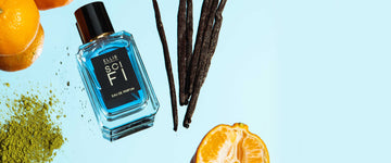 Sci Fi 50ml Eau De Parfum on mirrored background with vanilla beans, oranges, and green tea powder.