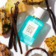 Miami Nectar 50ml Eau De Parfum with pineapple, vanilla beans, and coconut, on white background.