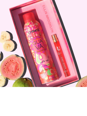 Amika x Ellis Brooklyn GUAVA GRANITA Perk Up Dry Shampoo and GUAVA GRANITA Eau de Parfum 10ml gift set next to whole and sliced guavas and slices of banana on pink background