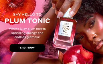 Woman with brown hair wearing pink highlighter holds PLUM TONIC Eau de Parfum 50ml against her head in one hand and a plum with a bite out of it in the other hand on a pink background with sliced plums and whole plums and white text that reads "Say hello to PLUM TONIC. Where juicy plum meets sparkling energy and endless glamour." and a black oval with white text that reads "Shop Now"