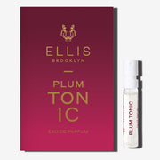PLUM TONIC 1.5ml Eau De Parfum Vial next to red ombre PLUM TONIC Eau De Parfum vial holder card on white background.