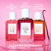 APPLE LOVE Eau de Parfum 50ml, PLUM TONIC Eau de Parfum 50ml, and QUEENS CARAMEL Eau de Parfum 50ml covered in water droplets next to vanilla bean and on top of water puddle on pink background with white text that reads "For Everyday Chic. For Girls' Night Out. For The Sweetest Date Night. Elevated Gourmands Inspired by NYC"