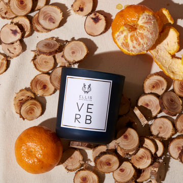 IMAGE 3: VERB CANDLE LAYING DOWN WITH SCENT NOTES