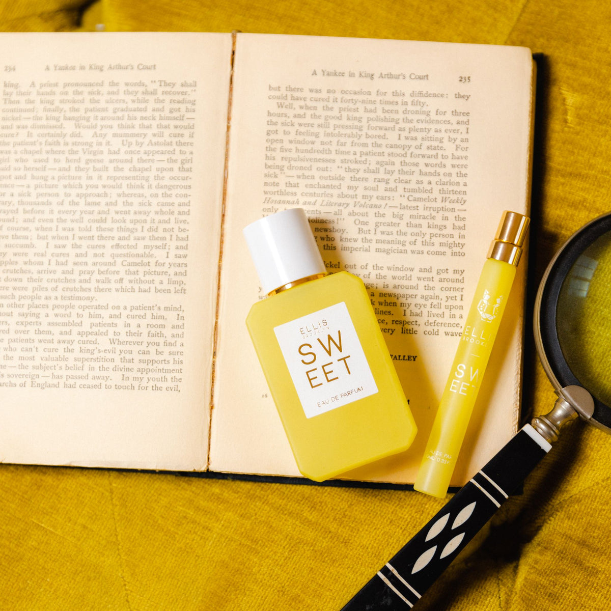 SWEET 50ml bottle & travel spray on book